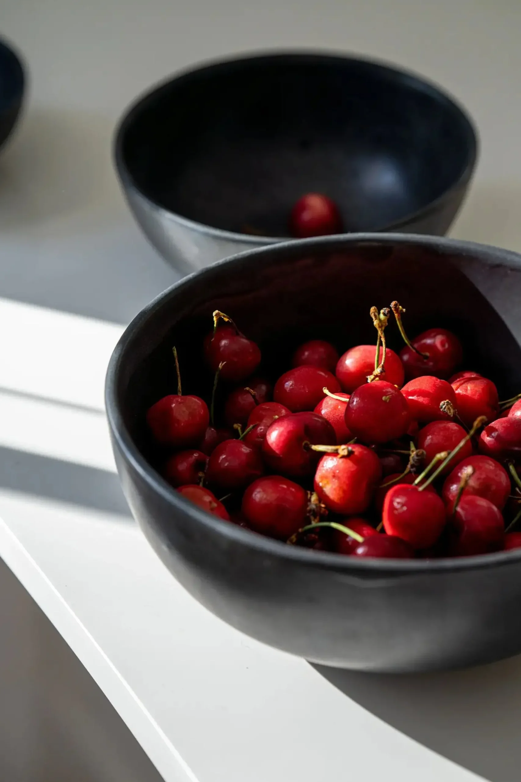 black_stoneware_nesting_b_0.webp Tabletop | Thistle Hill Black Stoneware Nesting Bowls