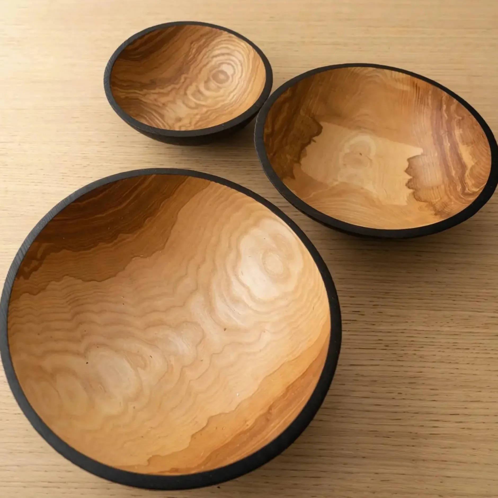 handcarved_charred_wooden_0.webp Home Decor | Pillows | Thistle Hill Hand-Carved Charred Wooden Nesting Bowl Set