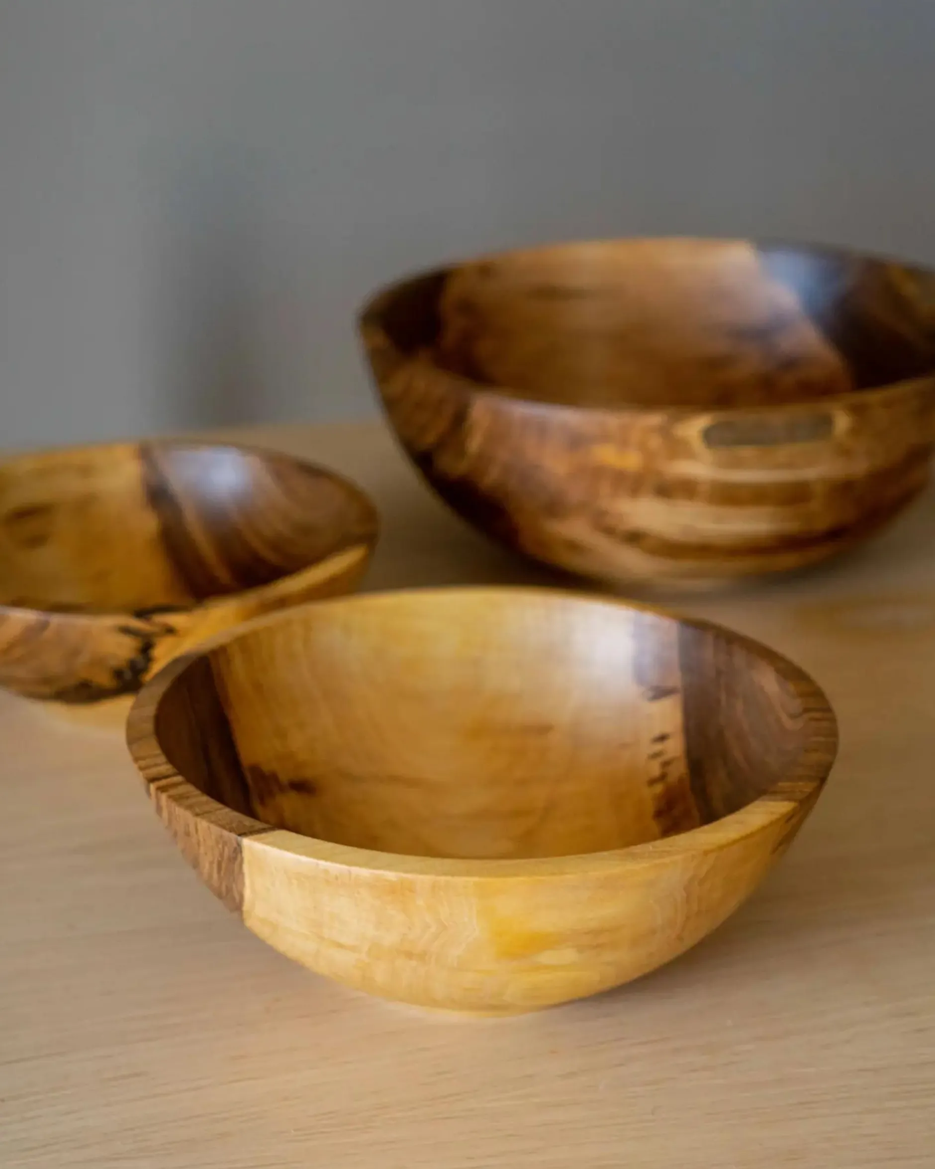 handcarved_wooden_nesting_1.webp Home Decor | Pillows | Thistle Hill Hand-Carved Wooden Nesting Bowl Set