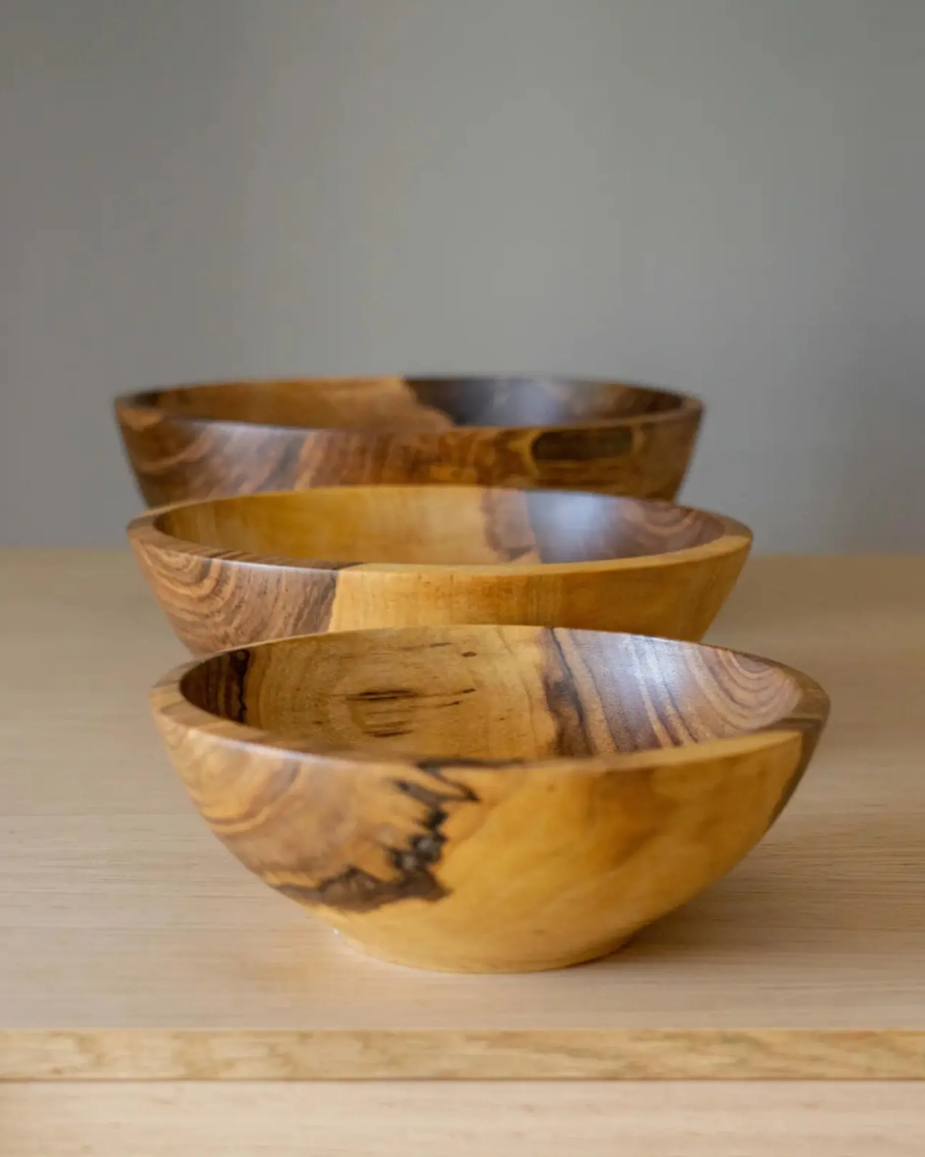 handcarved_wooden_nesting_3.webp Home Decor | Pillows | Thistle Hill Hand-Carved Wooden Nesting Bowl Set